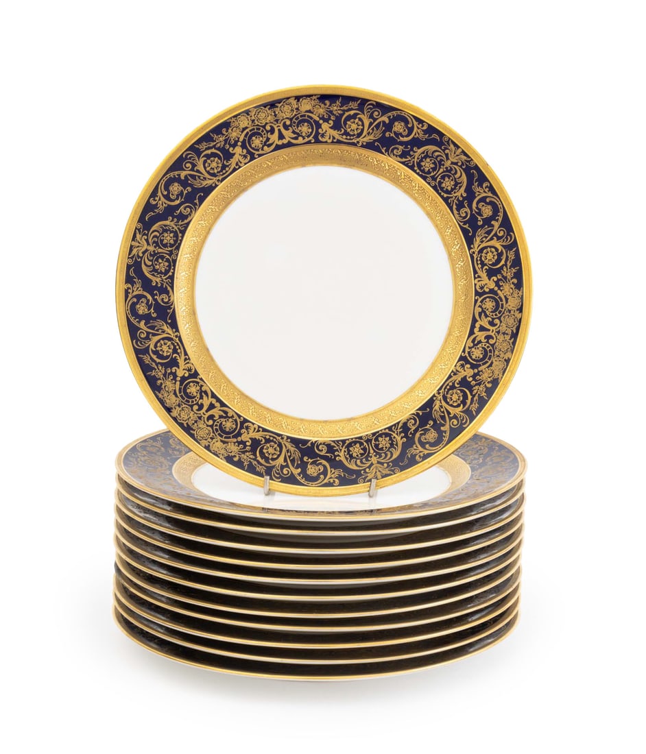 Charles Ahrenfeldt Limoges Porcelain Plates, 12: Set of Twelve Charles Ahrenfeldt Limoges for B. Altman Porcelain Dinner Plates, with blue painted and gilt scrollwork, marked to underside. 10.5" Diameter. Provenance: The Estate of Alton G. Marshall,