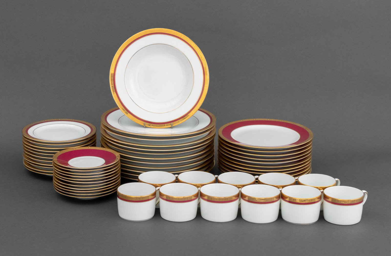 Bernardaud "Madison" Porcelain Service for 11: Bernardaud "Madison Carmin" Pattern Porcelain Dinnerware Service for Eleven, each marked "Bernardaud / Limoges / France / -Madison- / -Carmin-" and comprising: (11) dinner plates, (11) coffee cups, (1