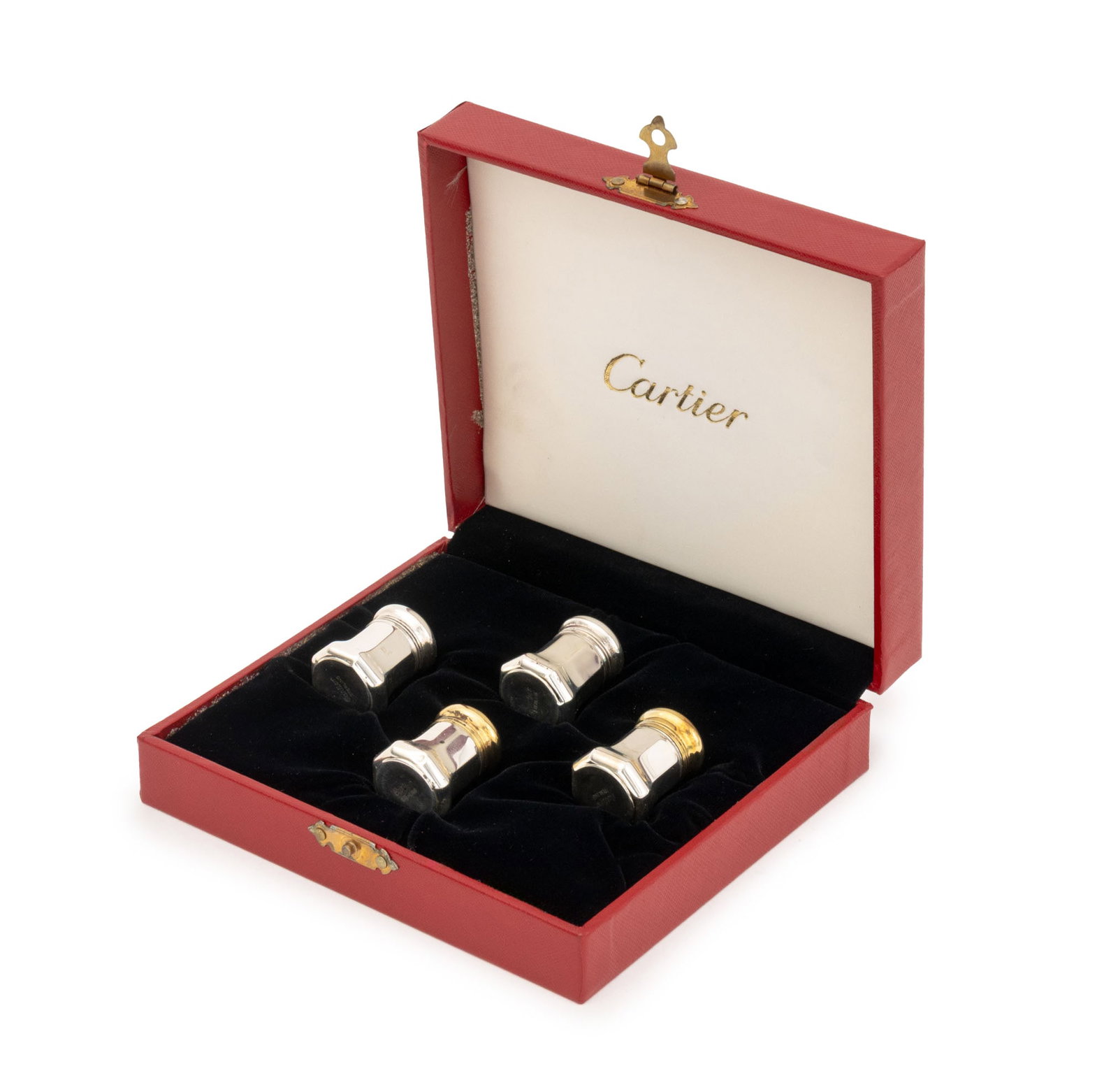 Cartier Sterling Silver Salt and Pepper Shakers, 4: Set of Four Cartier Sterling Silver Salt and Pepper Shakers, each marked "Cartier / Sterling" to underside, one pair with vermeil tops, with original red leather fitted case. Weight: 1.32 ozt; 1.5" H 