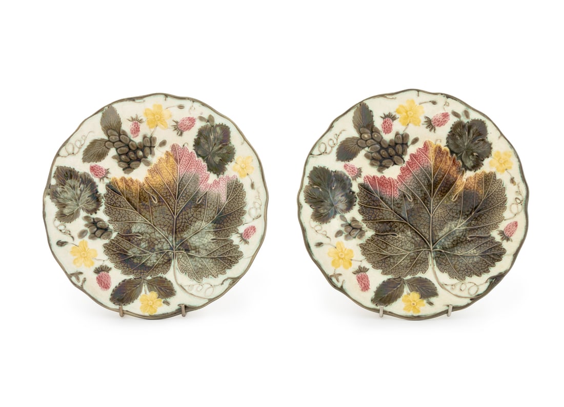 Wedgwood Majolica Strawberry Motif Plates, 2: Set of Two Wedgwood Majolica Strawberry and Grape Leaf Motif Plates, each marked "Wedgwood" to underside. 8.75" Diameter x 0.75" D. Provenance: From a Tribeca Estate. Keywords: Josiah Wedgwood, Britis