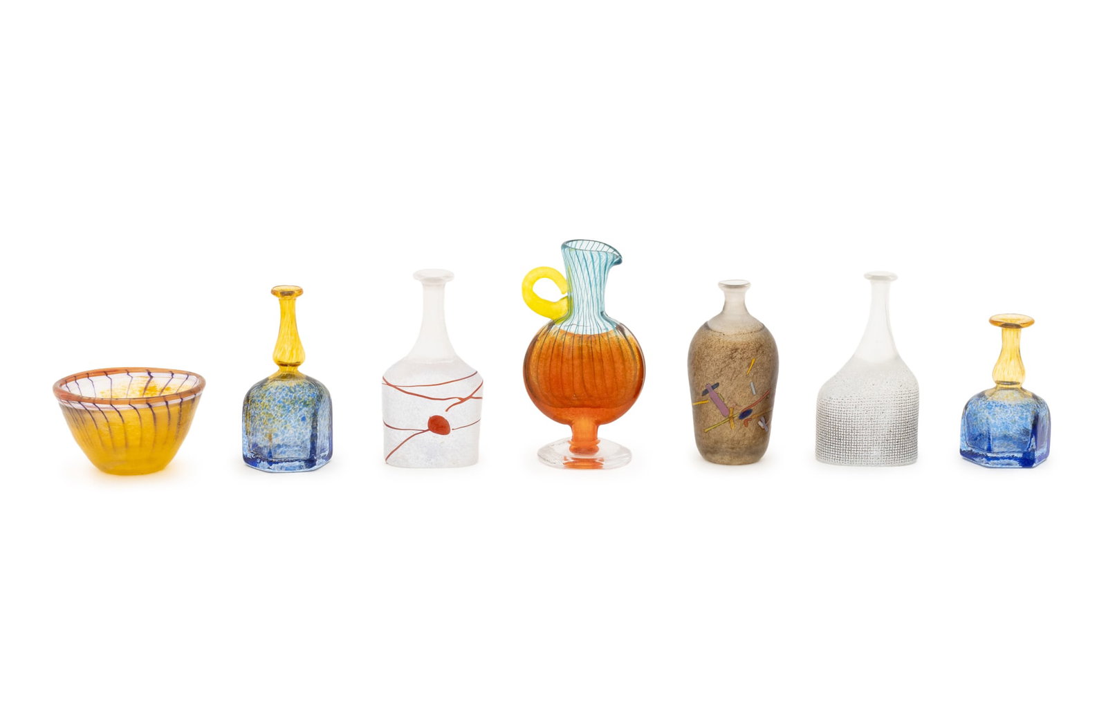 Kosta Boda Diminutive Glass Vessels, 7: Collection of Seven Kosta Boda Diminutive Glass Vessels, all marked and some with labels, one Kjell Engman (Swedish, b. 1946) miniature ewer, a diminutive bowl, and five Bertil Vallien (Swedish, b. 19