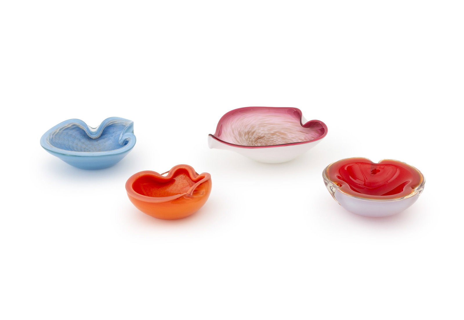 Murano Art Glass Pinched Rim Bowls, 4: Collection of Four Murano Art Glass Pinched Rim Bowls, comprising: one red and white, one powder blue with golden flecks, one iridescent coral-tone, and one pink and white oval form with tapered rim.