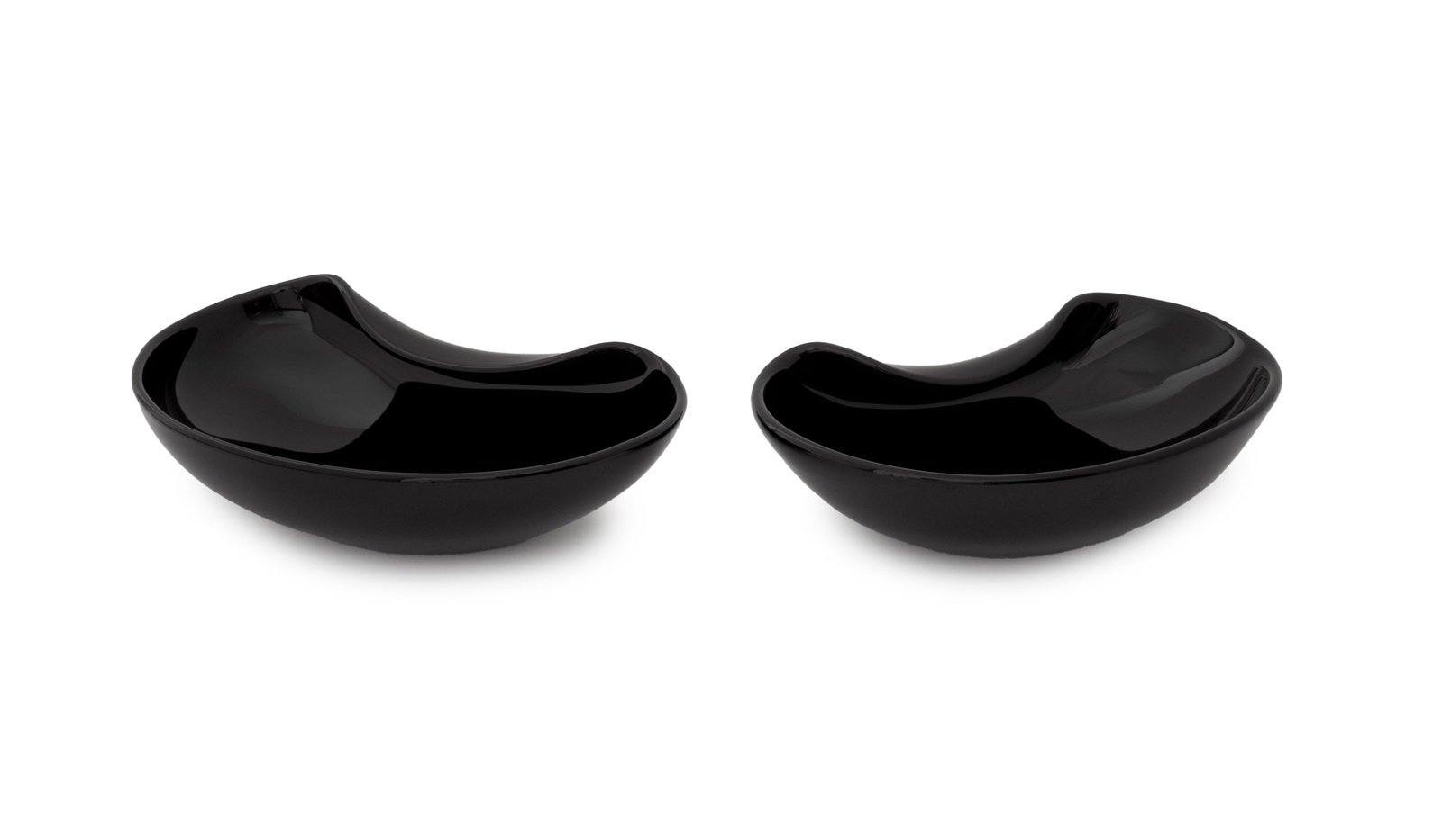 Elsa Peretti x Tiffany & Co. Thumbprint Dishes, 2: Pair of Elsa Peretti for Tiffany and Company Black Glass "Thumbprint" Oval Dishes, Tiffany & Co. label and signed to undersides. 2.75" H x 9" W x 6" D. Provenance: From a 500 Park Avenue Estate. Keywo