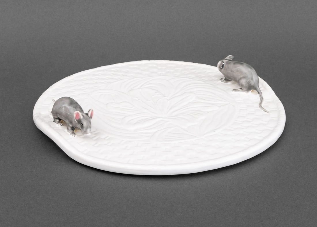 Bordallo Pinheiro Mouse Motif Cheese Plate: Bordallo Pinheiro Mouse Motif White Ceramic Cheese Plate, with two mouse form handles and central embossed flower, marked to underside. 2" H x 12.75" Diameter. Provenance: From the Fifth Avenue