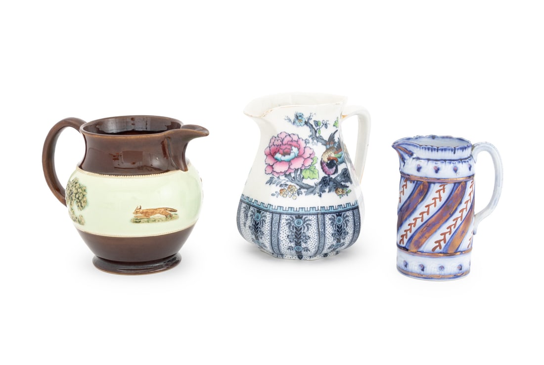 English Polychrome Glazed Ceramic Jugs, 3: Collection of Three English Polychrome Glazed Ceramic Jugs, comprising: a Charles Allerton & Sons cobalt blue lusterware jug, a Bourne Denby fox hunting motif glazed stoneware jug, and a Keeling & Co.