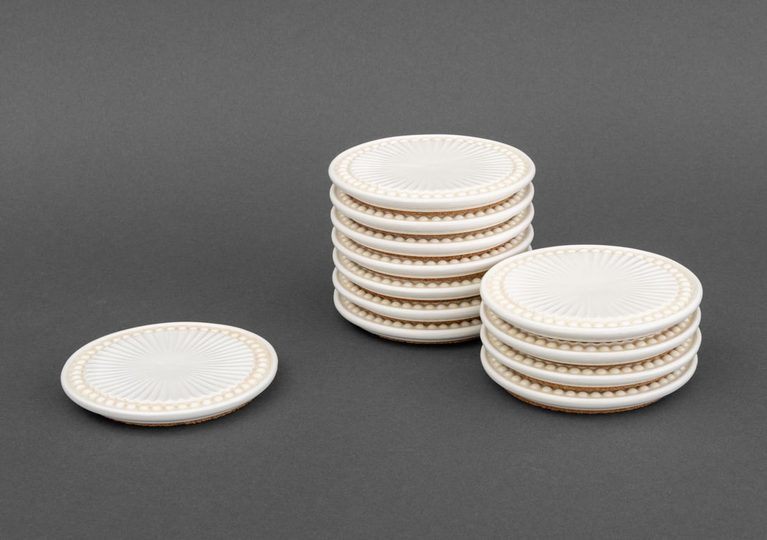 Lenox Porcelain "Butler's Pantry" Coasters, 12: Set of Twelve Lenox Porcelain "Butler's Pantry" Coasters, each white glazed with beaded edge and fluted design, marked to undersides. 4" Diameter x 0.25" D. Provenance: From an Upper East Side