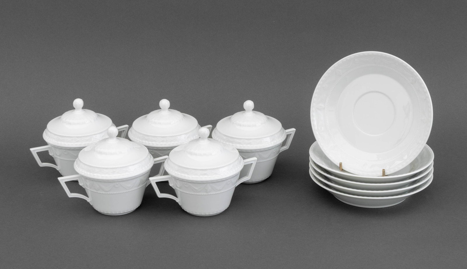 KPM Kurland Porcelain Soup Bowls & Saucers, 5: Set of Five KPM Kurland Porcelain Covered Soup Bowls and Saucers, marked to undersides. 5" H x 6.5" Diameter. Provenance: From a 500 Park Avenue Estate. Keywords: Konigliche Porzellan-Manufaktur, Germ