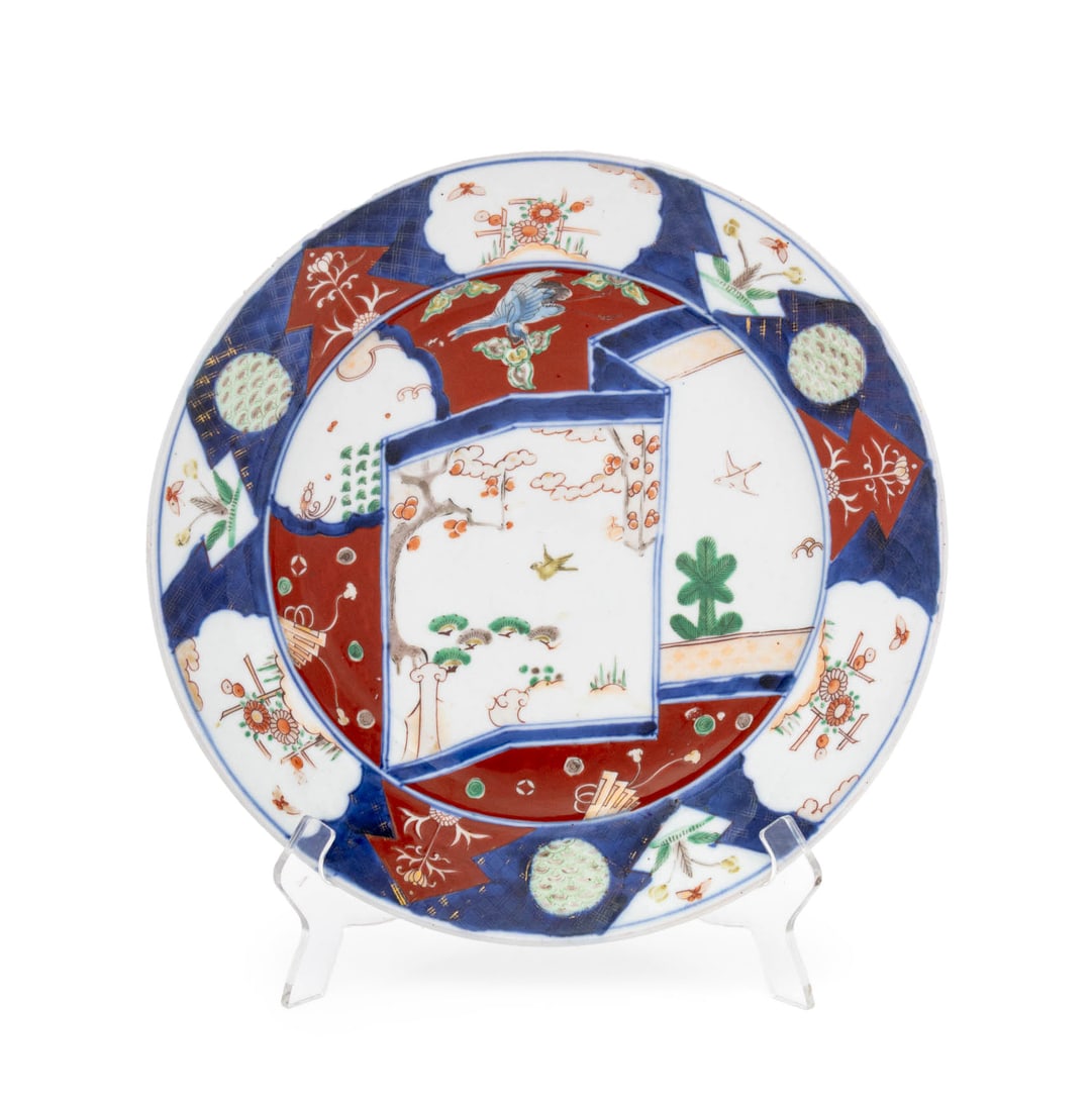 Japanese Imari Porcelain Charger: Japanese Imari Porcelain Charger, hand-enameled with vignettes of butterflies, flowers, and birds. 14.5" Diameter x 2.5" D. Provenance: From a 21 East 87th Street Estate. Keywords: Asian Art, Japanese