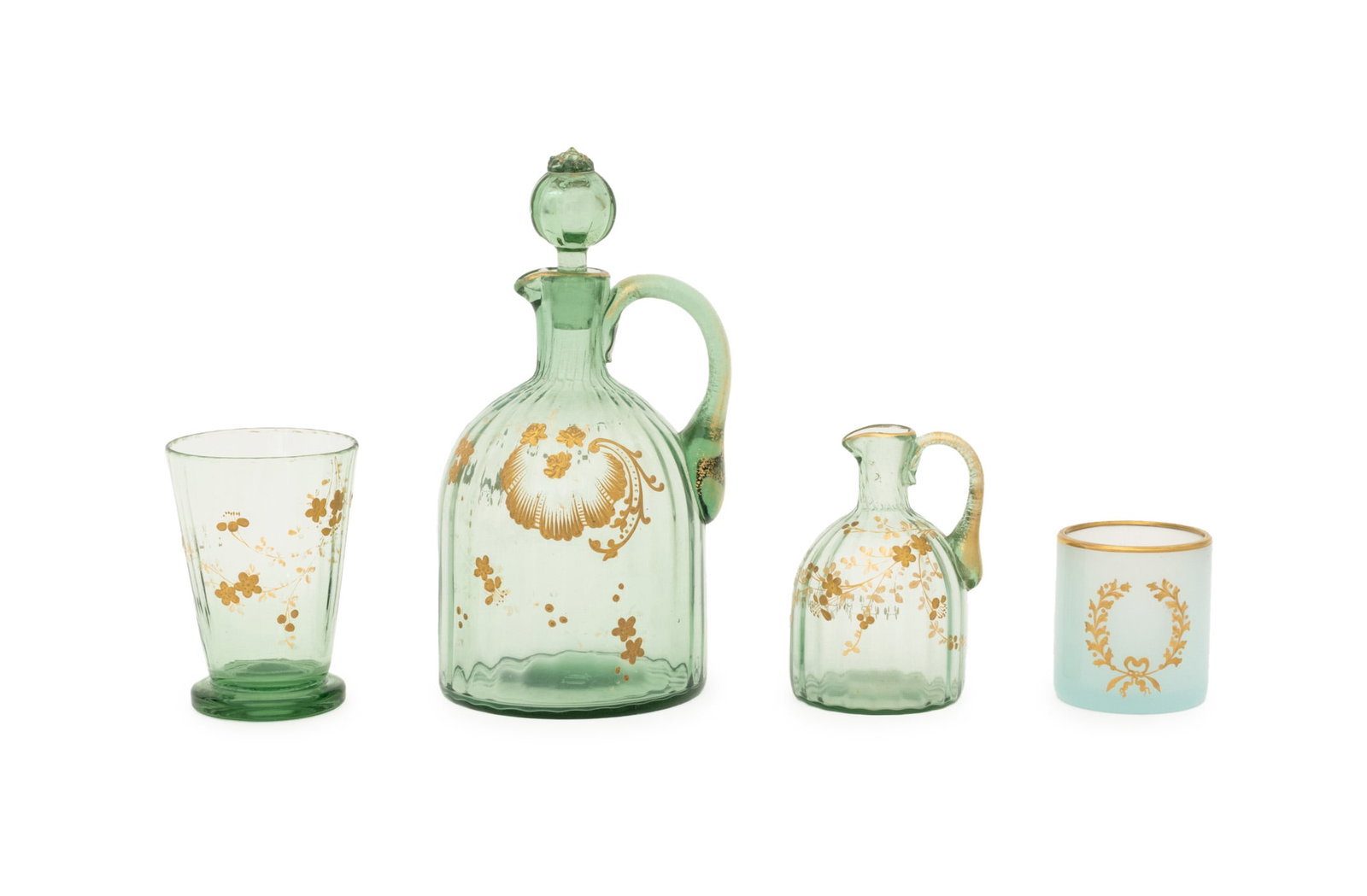 Gilt Painted Green Glass Vessels, 4: Collection of Four Gilt Hand-Painted Green Glass Vessels, comprising: a stoppered ewer, a diminutive jug, an opaque glass beaker, and a cup. Largest: 8.5" H x 4.5" W x 4.25" D. Provenance: From a Conn