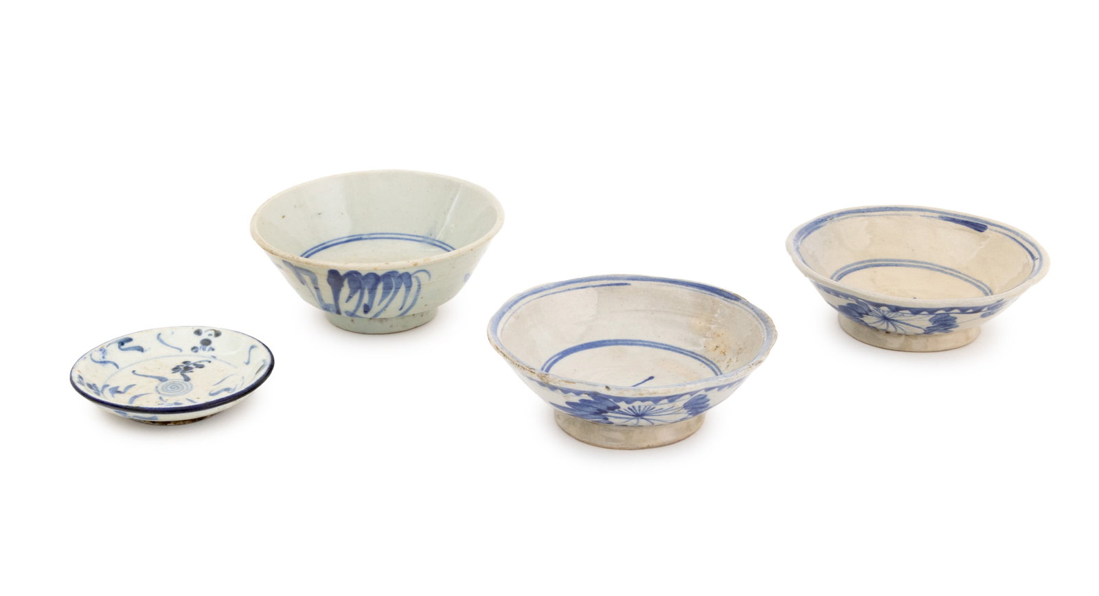 Chinese Blue & White Porcelain Tableware, 4 Pcs.: Collection of Four Chinese Blue and White Porcelain Tableware Pieces, comprising: three bowls with abstract design to center and one small saucer with spiral and abstract motif. Largest: 2.25" H x 5.2