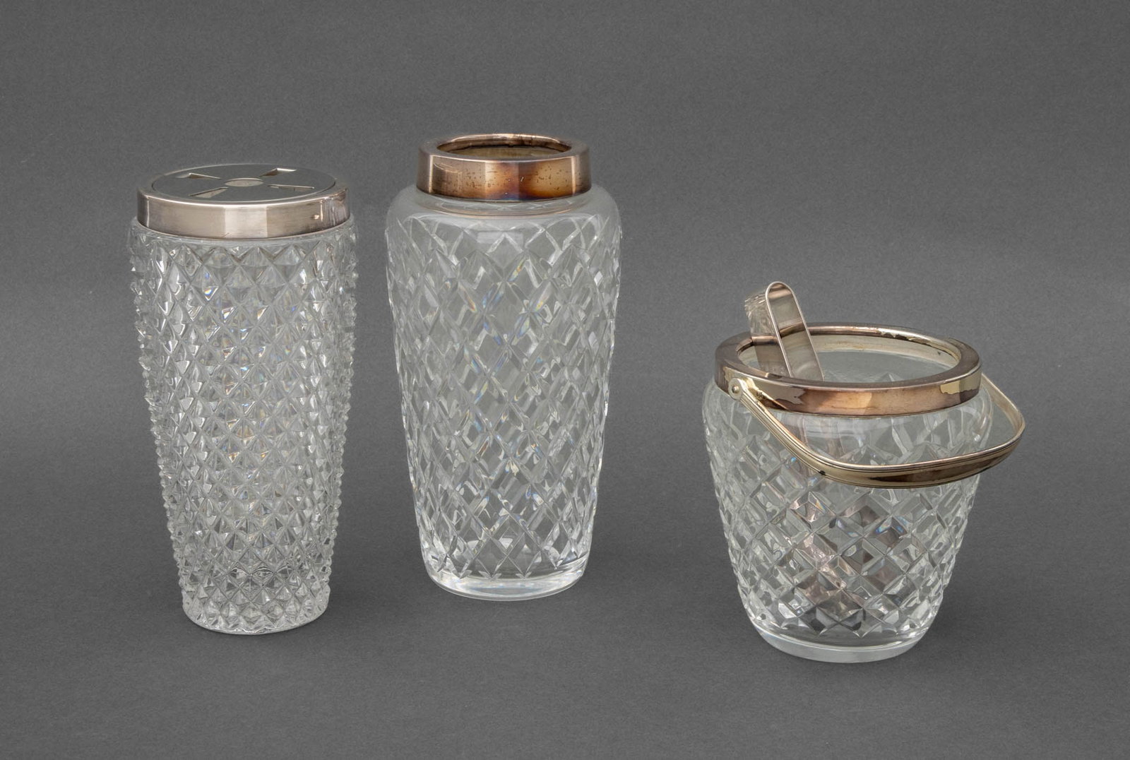 Modern Silver Plate & Cut Crystal Bar Articles, 3: Group of Three Modern Silver Plate and Diamond Cut Crystal Bar Articles, a vase, cocktail shaker, and diminutive ice bucket with tongs. Vase: 7" H x 3.5" Diameter. Provenance: From a West End Avenue C