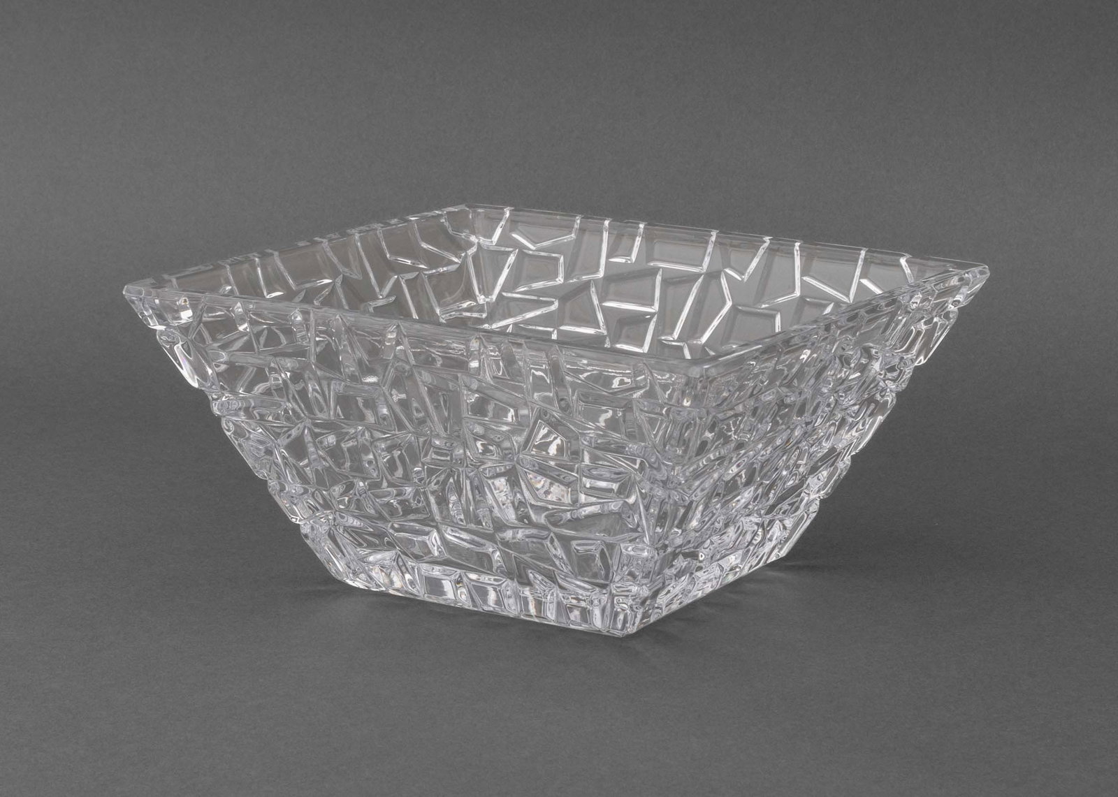 Tiffany & Co. "Sierra" Crystal Bowl: Tiffany and Company "Sierra" Crystal Bowl, square form with a textured geometric design, marked to underside. 4.5" H x 9" W x 9" D. Provenance: From an Upper West Side Townhouse. Keywords: Designer,