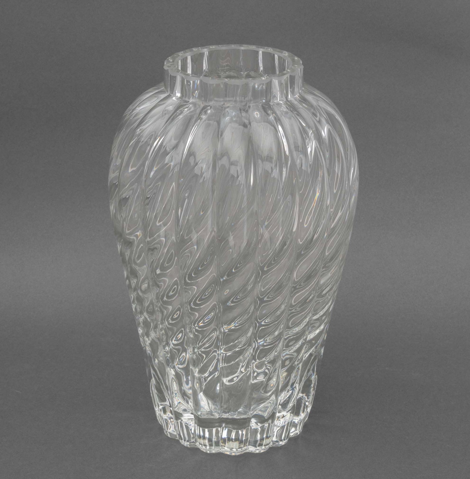 Tiffany & Co. "Oriental" Crystal Vase: Tiffany and Company "Oriental" Pattern Crystal Vase, marked to underside. 13.5" H x 8" Diameter. Provenance: From a 35 Sutton Place Estate. Keywords: Designer, Luxury goods, Flower vase, Optic swirl, 