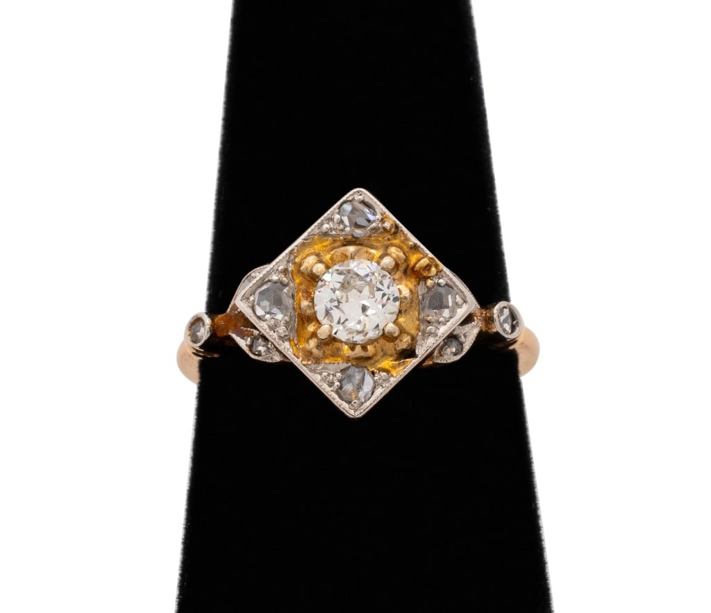 Art Deco Yellow Gold, Platinum, and Diamond Ring: Art Deco 14K Yellow Gold, Platinum, and Diamond Ring, featuring one prong set old European cut diamond weighing approx. 0.35 carat, J - L color / SI2 clarity, further adorned with 8 bead set rose cut 