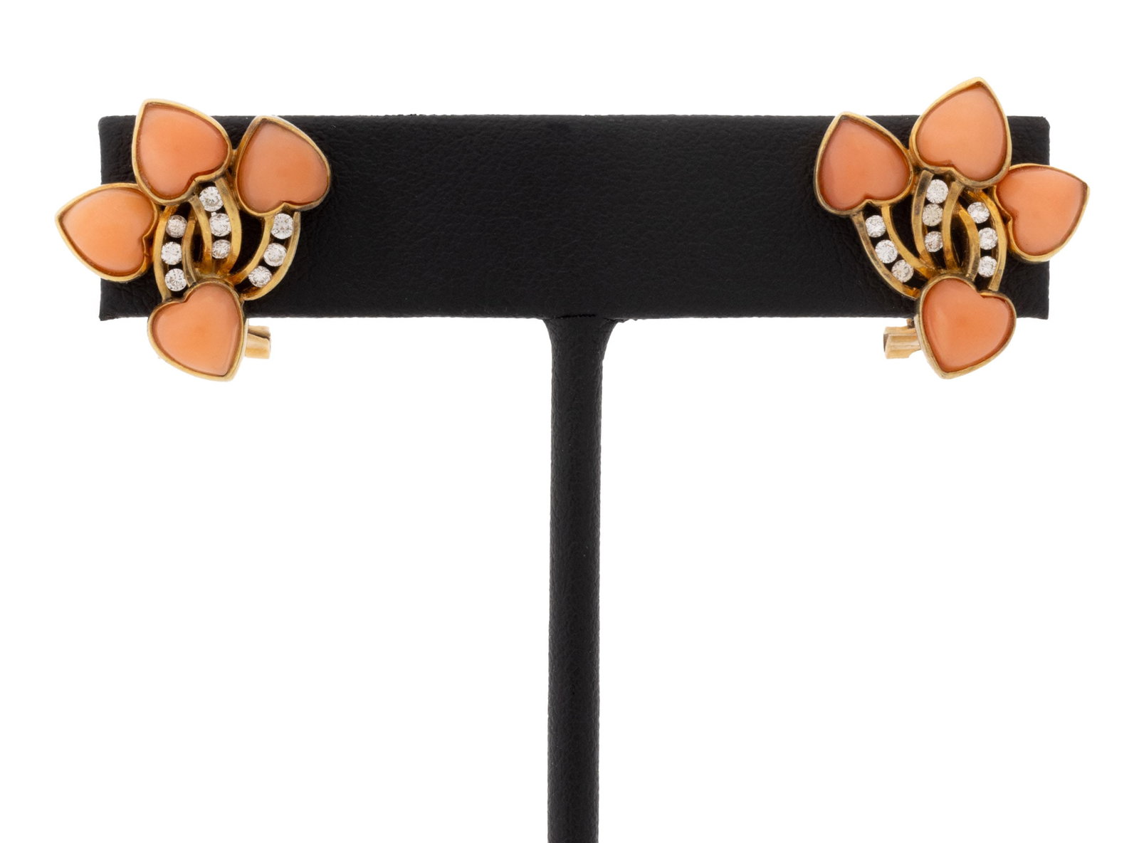 Heart Form Coral, Yellow Gold, & Diamond Earrings: Pair of 14K Yellow Gold, Coral, and Diamond Earrings, featuring eight bezel set heart shaped coral cabochons weighing a total of approx. 6.80 carats, further adorned with eighteen channel set round