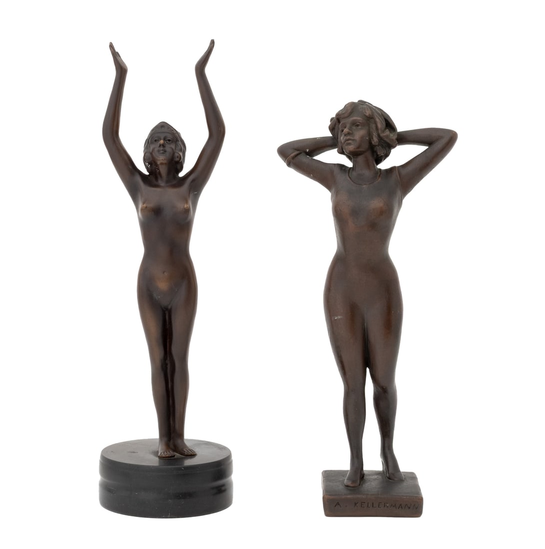 Art Deco Style Figural Bronzed Sculptures, 2: Two Art Deco Style Bronzed Spelter Figural Sculptures, comprising: Annette Kellermann in swimming garment, on square base, marked "A. Kellermann" and female nude wearing headdress on circular black