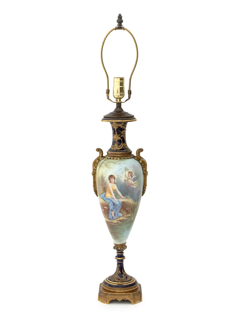 Sevres Blue Ground Ovoid Vase Mounted as Lamp: Sevres Blue Ground Gilt Metal Mounted Porcelain Ovoid Vase Mounted as a Table Lamp, early 20th century, painted with a continuous scene of a maiden fishing with a cupid catching butterflies, signed "E