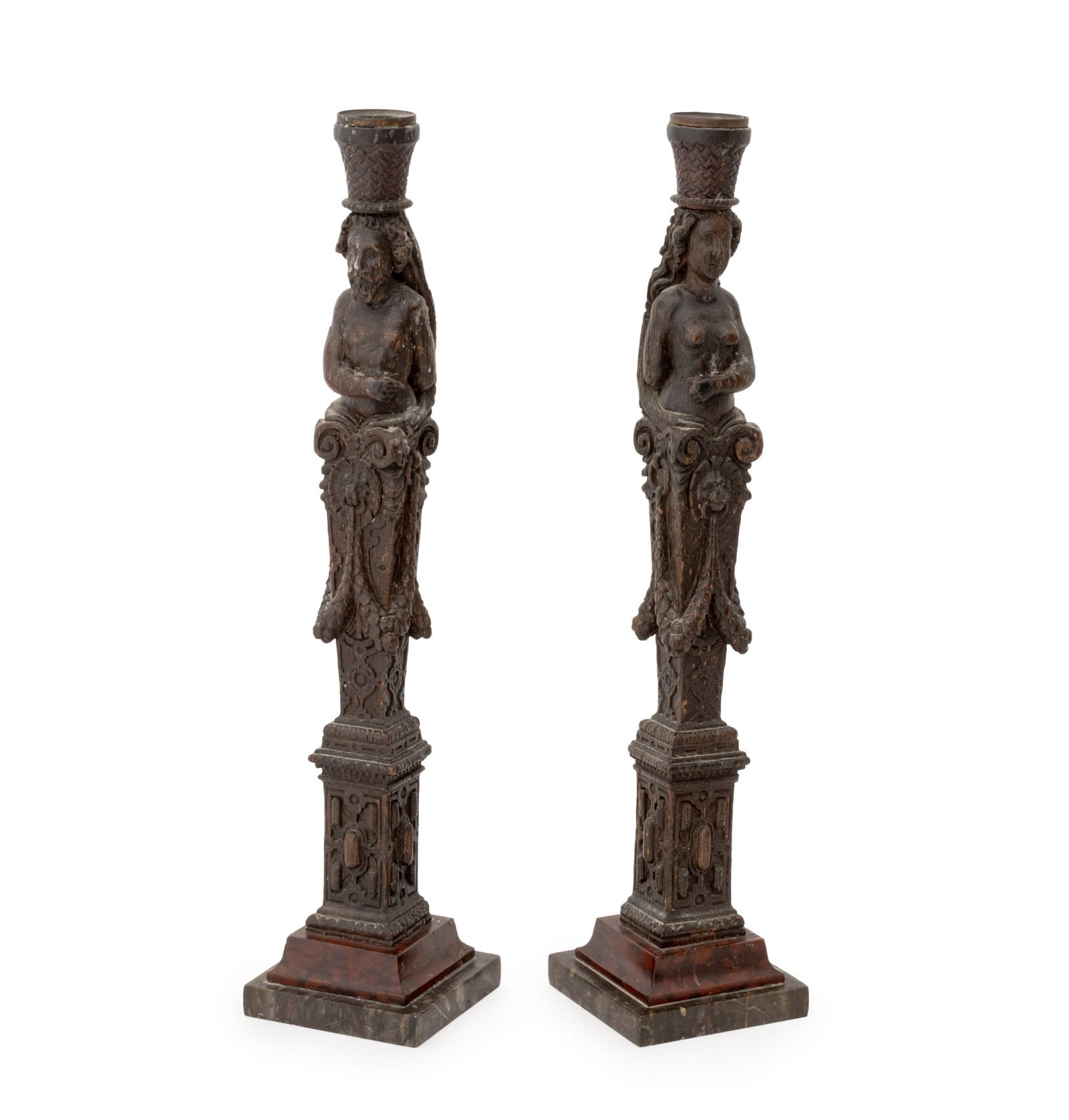 French Oak Caryatid Figure Candlesticks, Pair: Pair of French Carved Oak Caryatid Figure Candlesticks, 19th century, with lion head and garland motif, the candle sconce, likely added later, mounted on later black and red marble square base. Overal