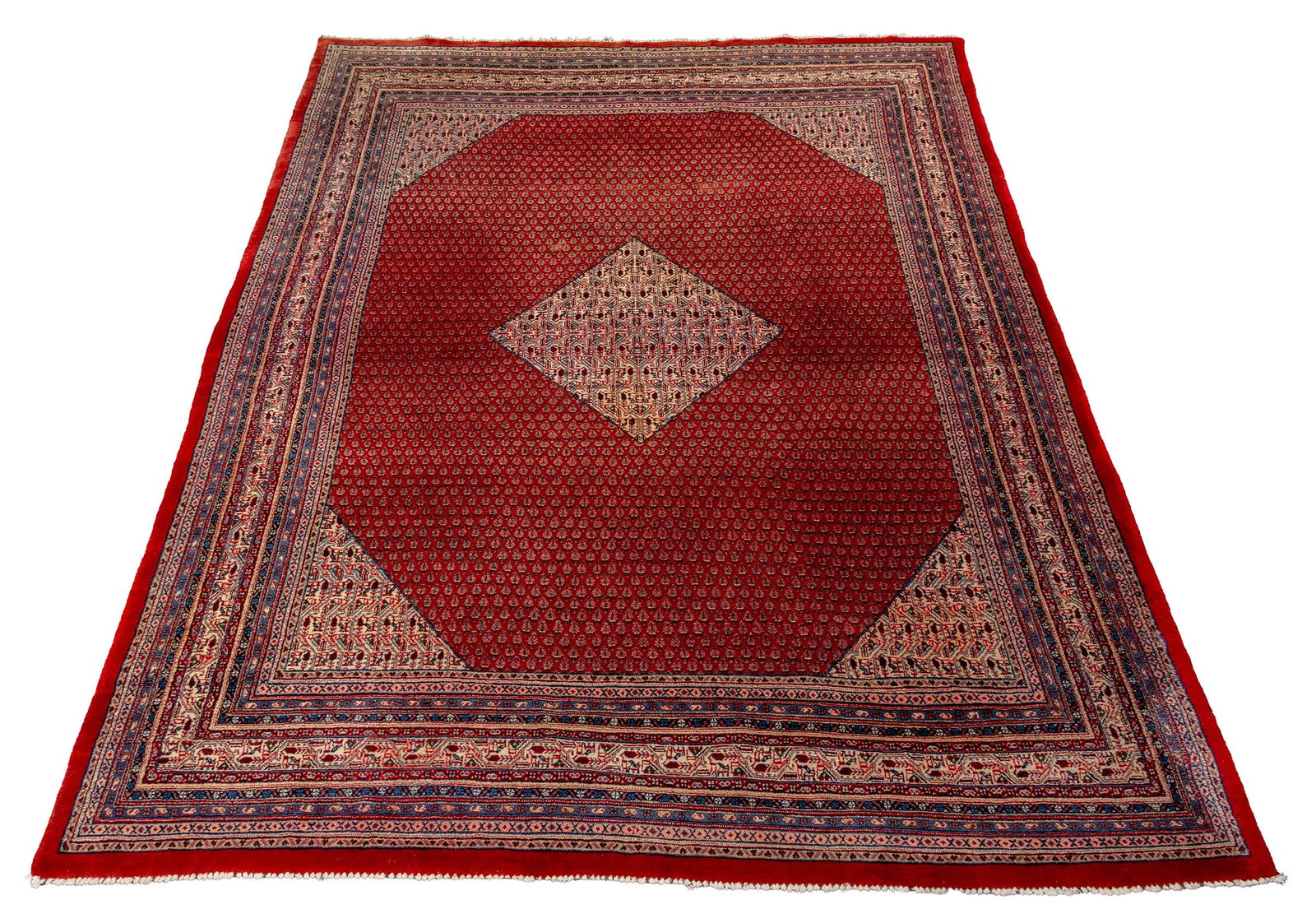 Iranian Mir Sarouk Carpet, 12' x 8' 10": Iranian Mir Sarouk Hand-Woven Wool Carpet, with repeating geometric design on red ground, "Made in Iran" label to underside. 12' L x 8' 10" W. Provenance: From a Central Park West Collection.
