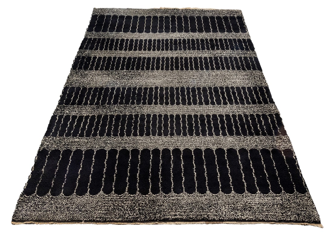 Moroccan Geometric Carpet, 14' 11.5" x 9' 7": Moroccan Geometric Design Wool Carpet, beige abstract design on black ground, "Made in Morocco" label to underside. 14' 11.5" L x 9' 7" W. Provenance: From an Upper West Side Estate. Keywords: