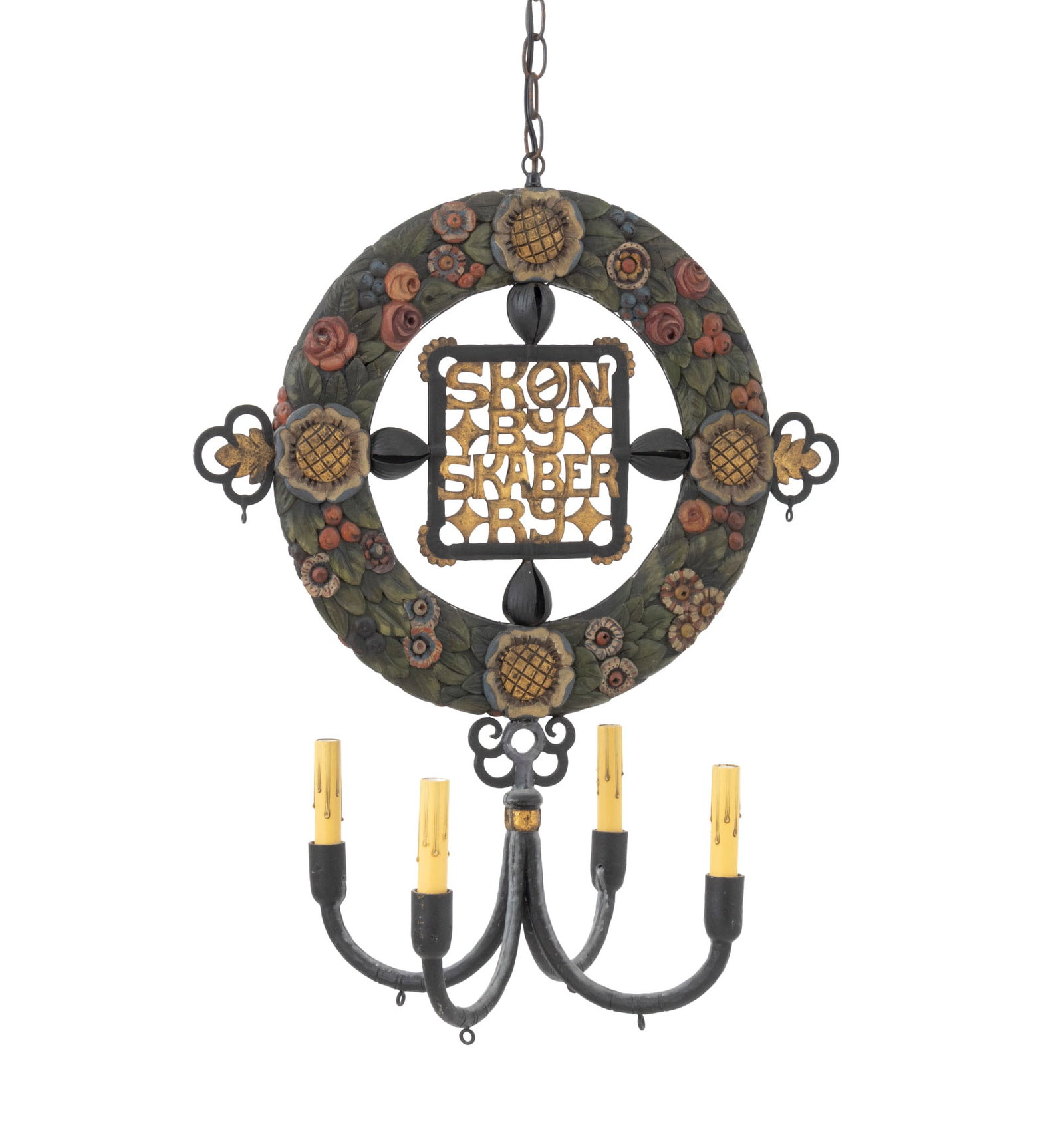 Scandinavian Polychromed Wood and Iron Chandelier: Scandinavian Polychrome Painted Carved Wood and Wrought Iron Four Light Chandelier, with gilt-decorated "Skon by Skaber Ry" plaque to center. 29" H x 22.5" W x 11.5" D. Provenance: From a 21 East 87th