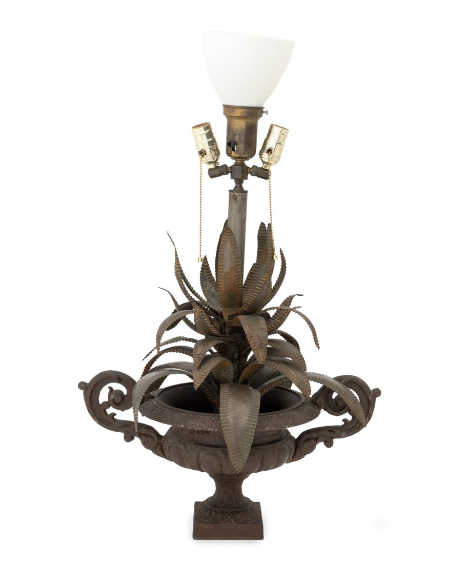 Maison Jansen Style Cast Palm Leaf Motif Lamp: Maison Jansen Style Cast Iron and Sheet Metal Palm Leaf Motif Table Lamp, the urn with scroll form handles and milk glass shade. 31" H x 20" W x 17" D. Provenance: From a 21 East 87th Street Estate. K