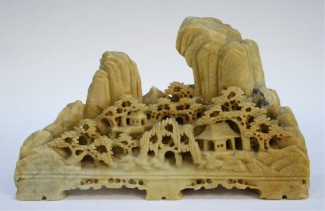 Soapstone Carving of Mountain Landscape: Soapstone carving of mountain landscape with trees and buildings, possibly Chinese; marked. Dimensions: 4"H x 6-5/8"W x 1-3/4"D