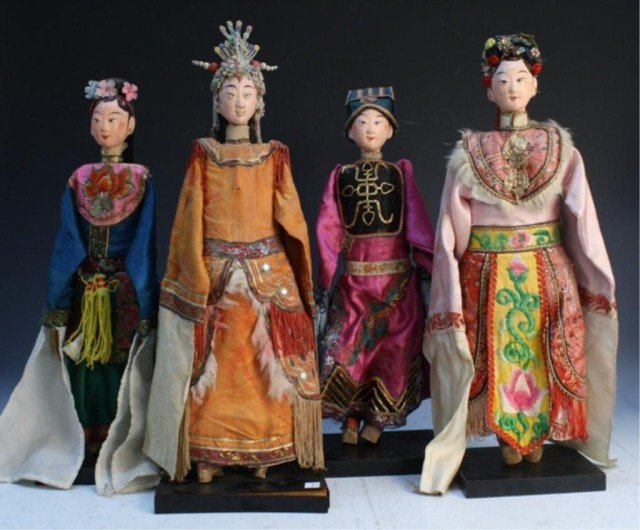 Chinese Opera Puppet Dolls Lot of 4: Lot of 4 Chinese Opera puppet dolls, each wearing different costumes: robes range from pink, dark blue, orange and purple, all wear headpieces, China; unmarked. Dimensions: Blue robe: 19" L (with base