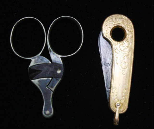 Lot of 2 Cigar Cutters: One brass cigar cutter marked "Marathon" with etched design and one unmarked, possibly silver plated cigar cutter. Dimensions:1) 2-1/2" L x 7/8" W; 2) 2-1/4" L x 1-5/8" W