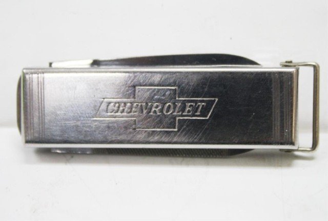 Chevrolet Promotional Pocket Knife: A miniature, stainless steel pocket knife with nail file and compartment, possibly a pill box, promotional item for Chevrolet; marked. Dimensions: 2-1/8" L ; blade 1-5/8" L