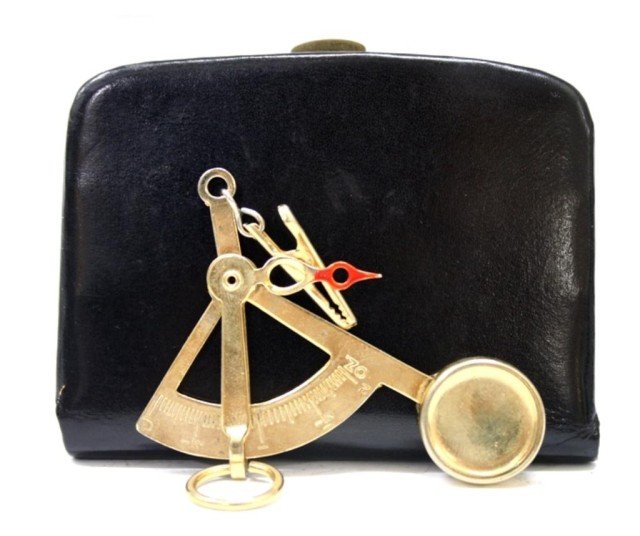 Gold Colored Metal Portable Scale w/ Pouch: A gold colored metal, portable scale with pouch; pouch is marked "Germany". Dimensions: Scale 4" L ; pouch 3-1/2" L x 2-3/4" W