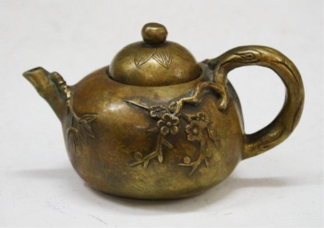 Chinese Copper Tea Pot With Floral Design: Copper tea pot, China; "Liu Yu Tao" mark. Dimensions: 5" H x 3" L (with handle)