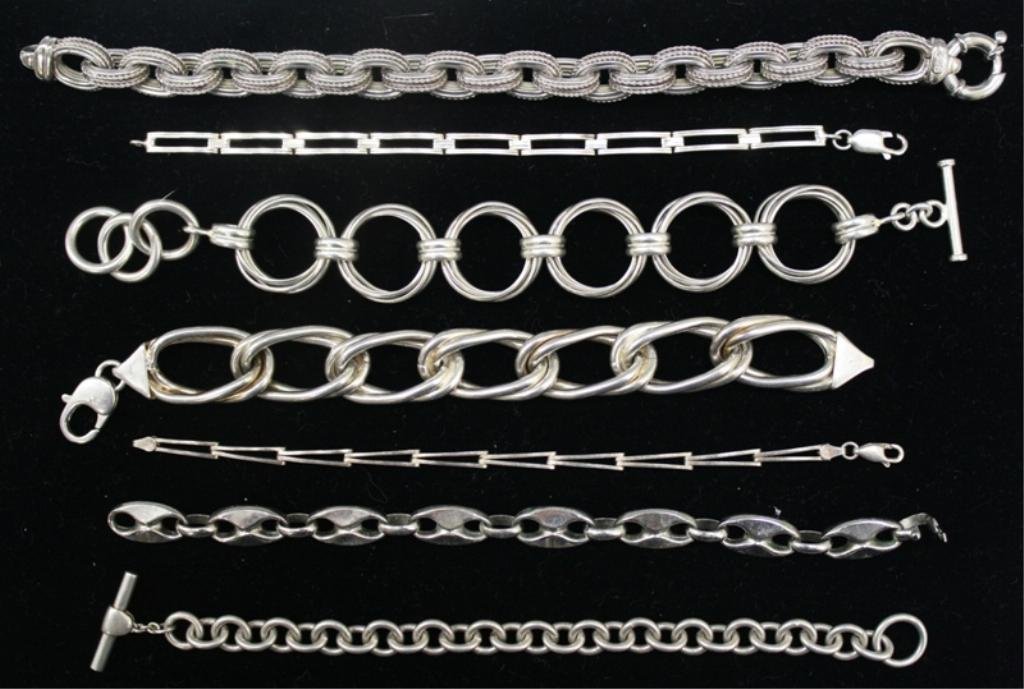 Lot of 7 Sterling Silver Chain Link Bracelets: Seven sterling silver bracelets; marked. Weight and dimensions: 200 grams; 7" L - 9" L