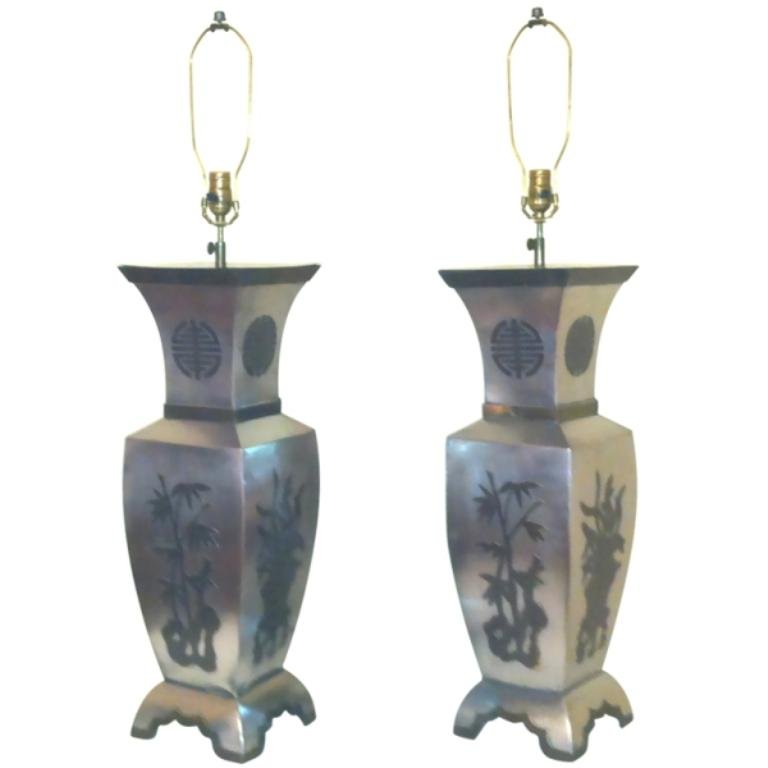 Pair Hollywood Regency Asian Inspired Pewter Lamps: Pair of stunning monumental Hollywood Regency style pewter table lamps by Marbro Lighting, c.1960s. These highly decorative Asian Modern lamps are accented with raised brass decoration and wired with 
