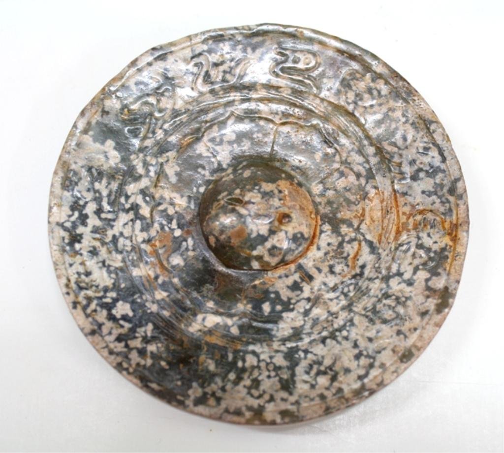 Small Chinese Han Dynasty Carved Jade Mirror: A small carved jade mirror, Han Dynasty, China; unmarked. Dimensions: 10" L x 4-1/2" diameter