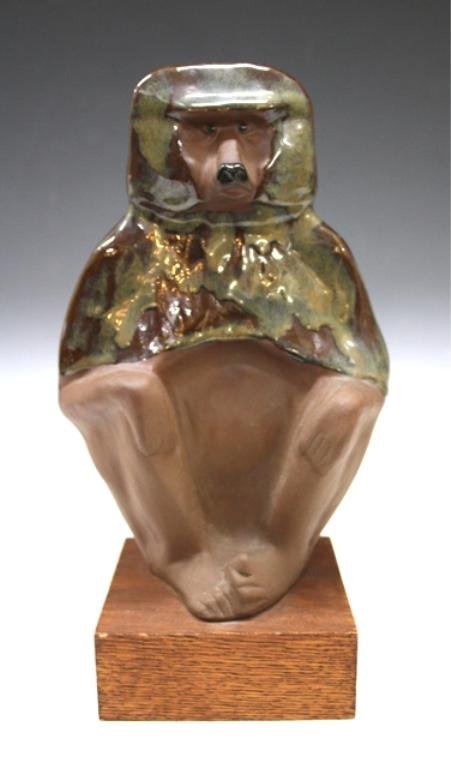 Pottery Orangutan Sculpture: Pottery sculpture of Orangutan with green/brown glaze; unmarked. Dimensions: 10-1/2"H x 6"W x 4"D