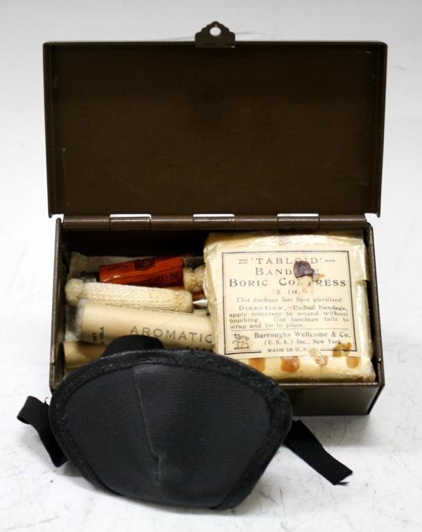 Vintage MSA First Aid Kit w/ Contents: A first aid kit with eye patch, bandages, burn ointment, iodine swabs and more, United States; marked Mine Safety Appliances Co. , Pittsburgh, Pennsylvania. Dimensions: box 1-1/2" H x 4-1/2" L x 2-1/2