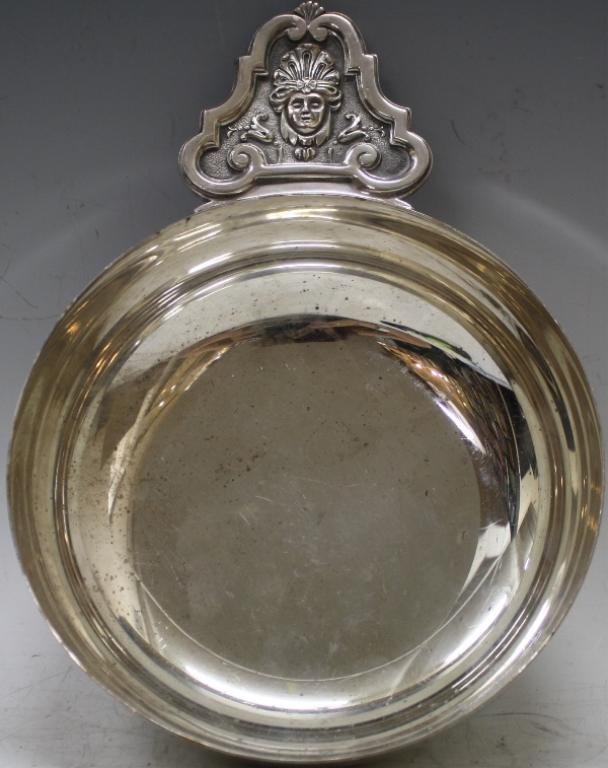 Christofle Silver Plate Bowl with Handle: Christofle sliver plated bowl with detail of a face on the handle. Dimensions: 7" diameter w/o handle, w/ handle 10"