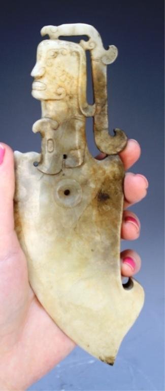 Chinese Han Dynasty Carved Jade Knife: Carved knife with incised face-shaped handle, jade, China, possibly Han Dynasty (206BC-AD220); unmarked. Dimensions: 7-1/2"L x 2-1/2"W
