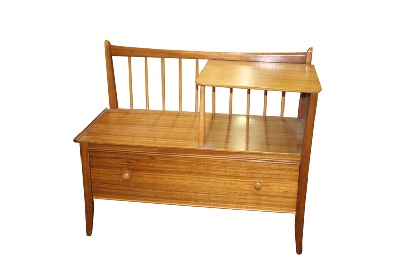 Mid Century Australian Walnut Gossip Table: Mid Century gossip table constructed of walnut, bench and telephone table combo with one large horizontal bottom drawer. Back rest with spindles, Australia; unmarked. Dimensions: approximately 27"H x