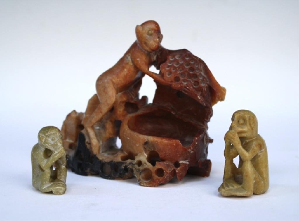 Lot of Three Soapstone Monkey Carvings: Lot of three soapstone monkey carvings, two small monkey figures and one carved bowl with monkey, possibly Chinese; unmarked. Dimensions: first 1-5/8"H x 3/4"W x 1-1/4"D; second 1-3/8"H x 5/8"W x 1"D;