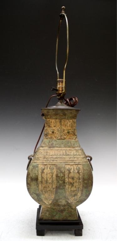 Chinese Bronze Vase Lamp poss. 2000 y/o: Bronze vase lamp with ring handles and geometric designs, China, bronze possibly 2000 years old; unmarked. Dimensions: 31"H x 8" squared