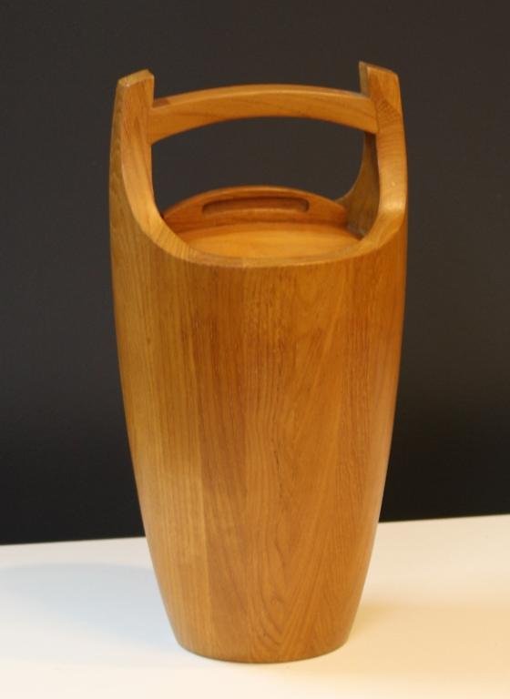 Dansk Mid Century Teak Wood Ice Bucket: A vintage, mid-century teak ice bucket or wine cooler, by Dansk. United States, c. 1970s; marked on bottom "Dansk International Designs LTD/Thailand/JHQ." Dimensions: approx. 7-1/2" diam x 15-1/8" H.