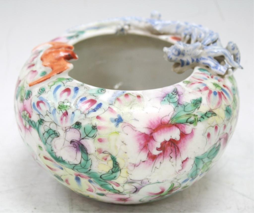 Chinese Export Famille Rose Dragon & Bat Washer: A famille rose brush washer with flower design and dragon and bat on the rim, China; marked. Dimensions: approximately 3-1/2" H x 5-1/4" diameter