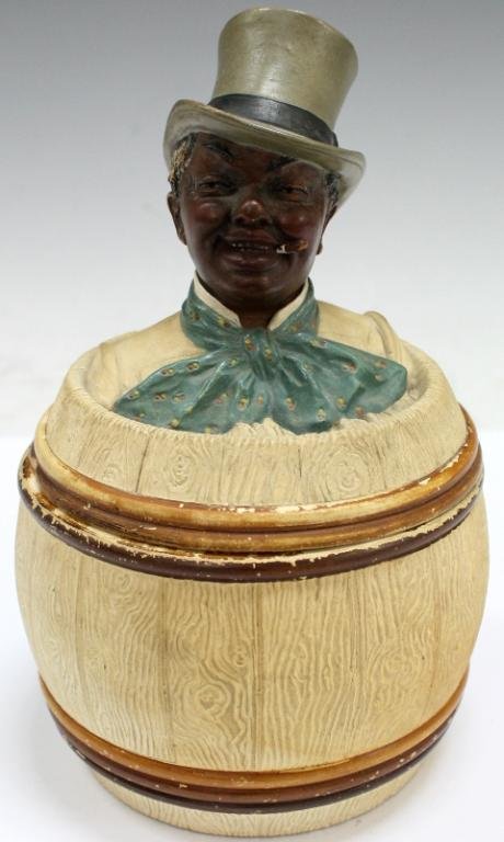 "Dandy" Johann Maresch Tobacco Jar: An antique ceramic tobacco jar by the Austrian ceramic company of Johann Maresch, with the bust of a "black dandy" on the lid. Austria, late 19th - early 20th century; marked on bottom "JM I (or 1)/33