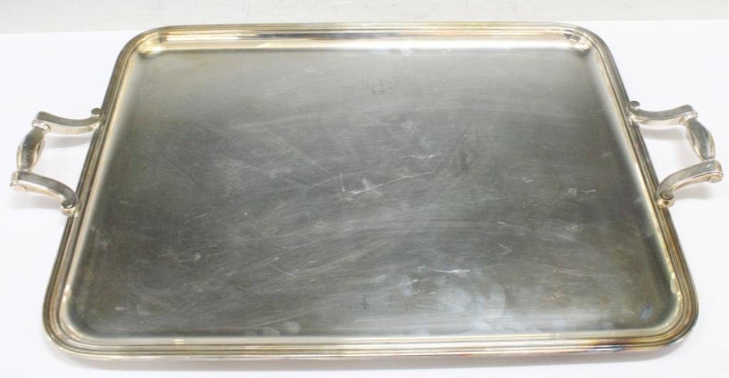 Christofle French Large Silverplate Tray: A large two-handled tray made by the French silver manufacturer Christofle in silver-plated copper. France, 20th century; marked with an unusual hallmark on the underside of the rim, "Christofle" writ