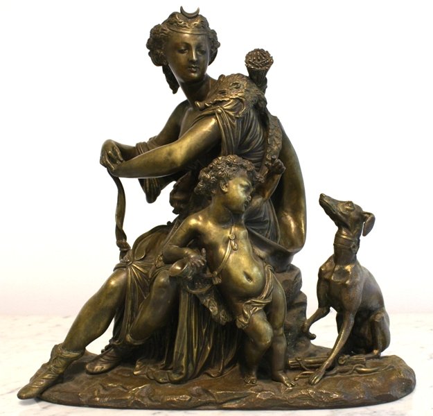 Bronze Sculpture of Diana, signed A. Carrier: A beautiful bronze sculptural group of Diana, Goddess of the Hunt and the Moon, with a child and dog by the French sculptor Albert Ernest Carrier Belleuse (1824-1887). Note the detail of the boar's sk