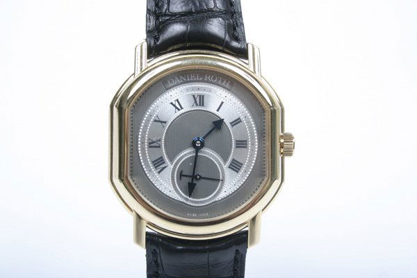 Daniel Roth Small-Seconds Edition Men's Wristwatch: Automatic. Limited Edition #123. solid 18k gold watch and buckle. Brand new watch with boxes and papers. This watch retails for exactly $16,600.