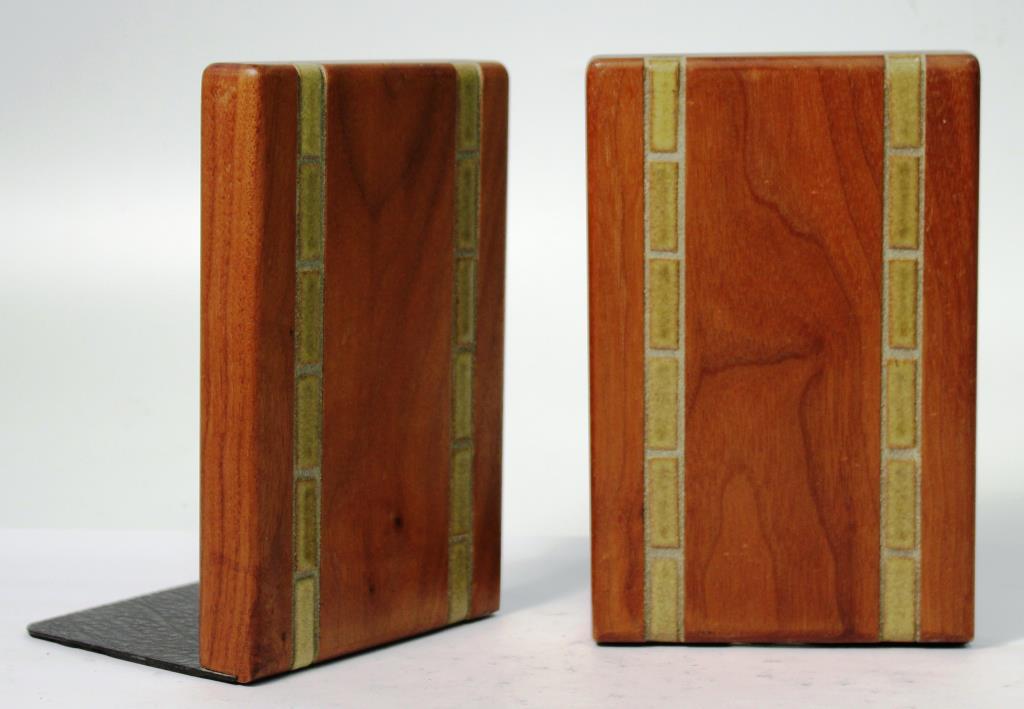 Martz for Marshall Studios Mid-Century Bookends: Wood and ceramic, circa 1960s, by Jane and Gordon Martz, each bookend a polished rectangular slab inlaid with two vertical ribbons of ceramic tile, one marked underneath "Marshall Studios, Inc./ WBER2