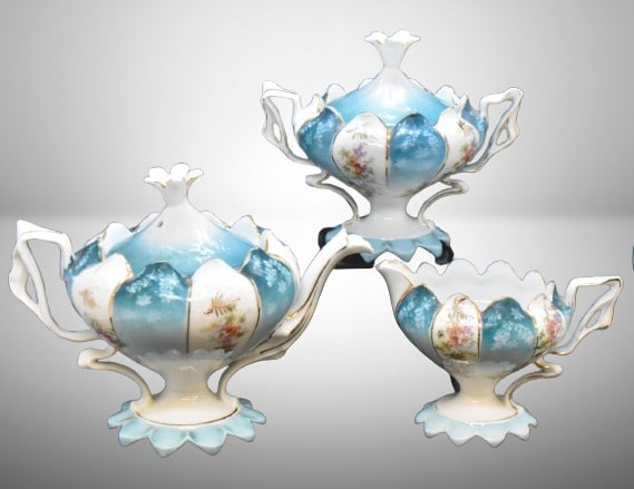 Unm. 3 pc. tea set in Steeple Mold 12, alternating panels of flower clusters and blue finish w/: Unm. 3 pc. tea set in Steeple Mold 12, alternating panels of flower clusters and blue finish w/ shadow flowers;